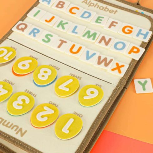 Montessori szenzoros manipulációs tábla bőrönd dinoszauruszok